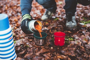 Soup being poured from flask