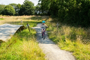 Young girl cycling at Stratton Bike Trail