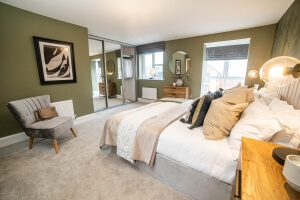Picture of large master bedroom at Equinox I townhouse show home