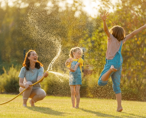 Children playing in green open space