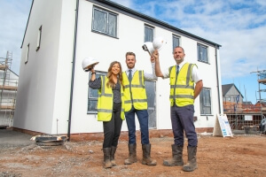 Jazz, Tom and Kevyn out the front of a Cavanna Home 