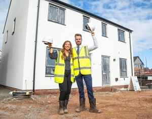 New home owners out the front of new Cavanna home