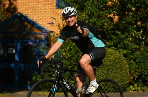 Picture of Cavanna colleague riding bike in charity fundraiser