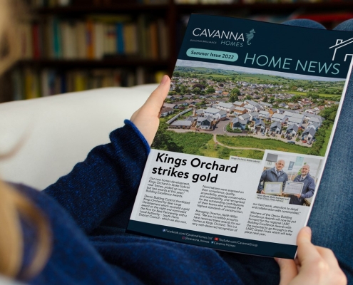 picture of person reading Home News magazine