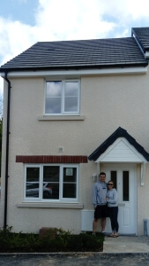 Tom and Megan out the front of their first Cavanna Home