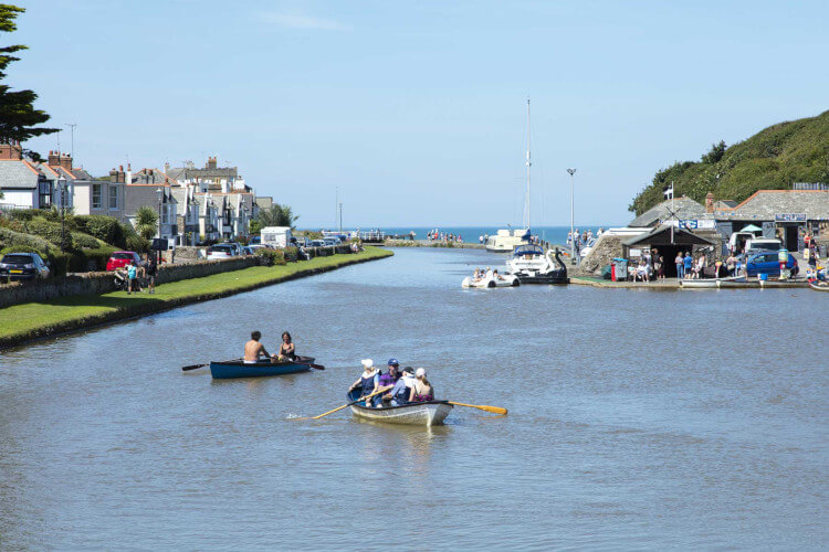 People rowing boats on Bude Canal