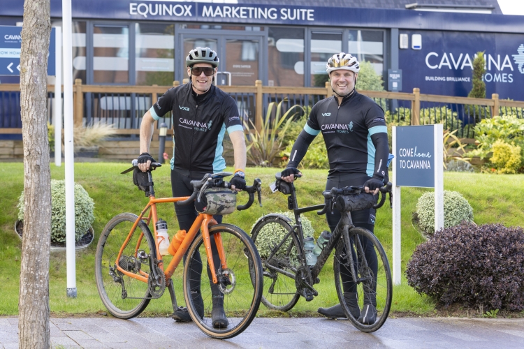 Ben Rowntree and Michael Newman cycling through Cavanna Homes' Equinox development.